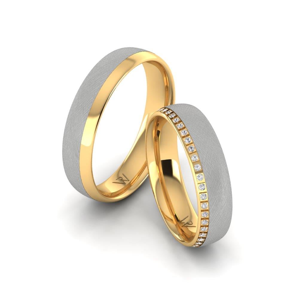 Eheringe mit Radiance-Steinen aus Gelbgold und weißem Dalloz-Kristall