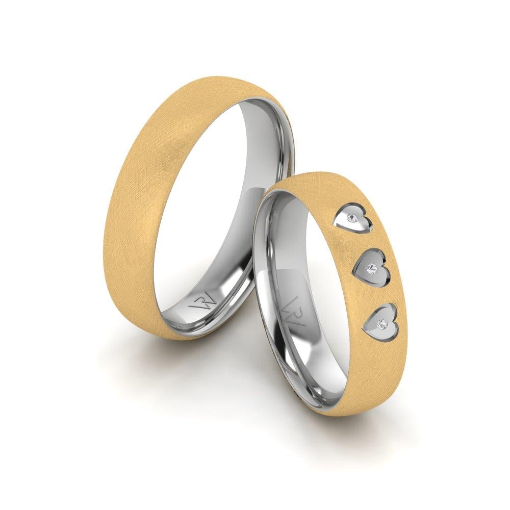 Eheringe mit Radiantia-Steinen aus Weißgold und gelbem Kristall von Dalloz