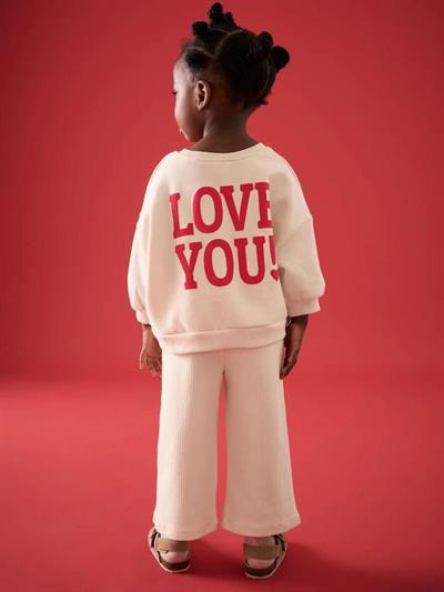 Kız Çocuk Pamuklu Bej Kalp Desenli Sweatshirt ve Geniş Paça Pantolon Takım - Yumuşak Dokulu Rahat Kalıp