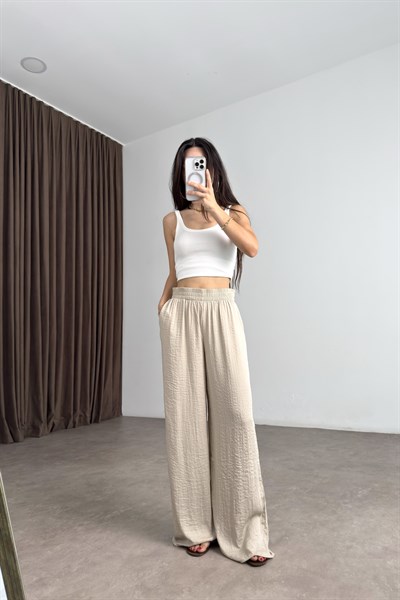 Beli Lastikli Dökümlü Parlak Dokulu Geniş Paça Bej Pantolon
