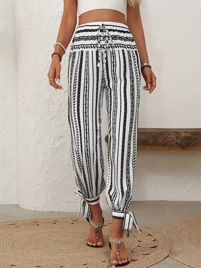 Kadın Yüksek Bel Desenli Paçadan Bağlamalı Yanları Yırtmaçlı Süprem Pantolon