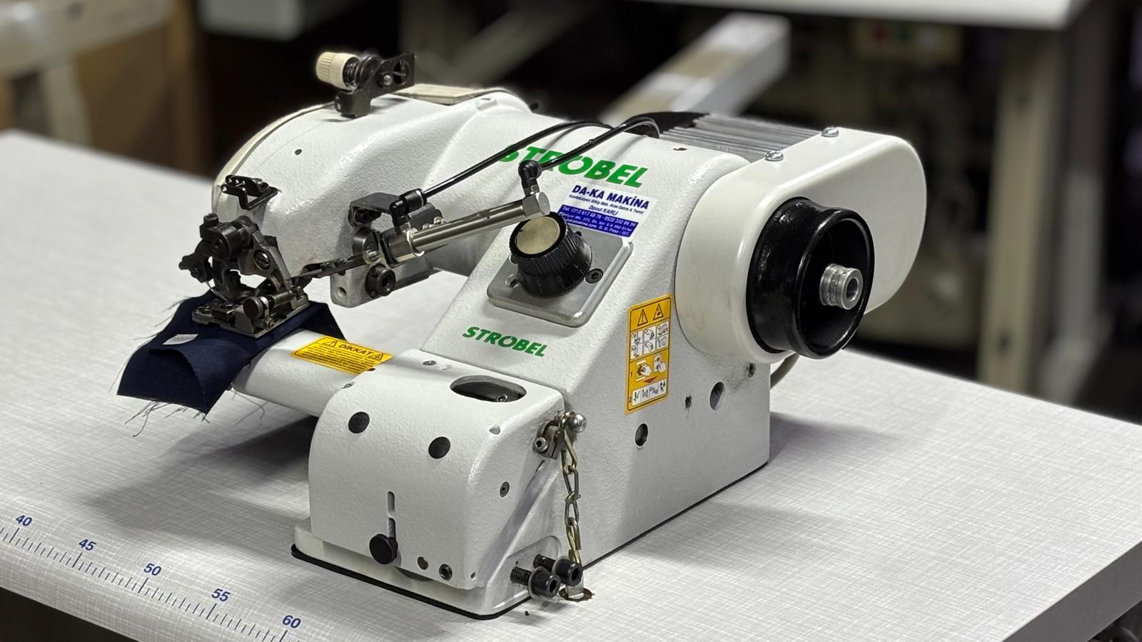 DA-KA Makina | STROBEL 103 Kafadan Motorlu Etek Paça Baskı Dikiş