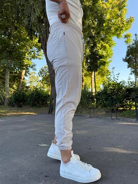 PARAŞÜT KUMAŞ PAÇA LASTİK PANTOLON KREM