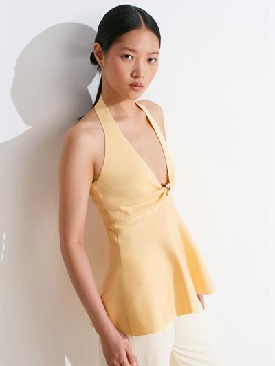 YELLOW HALTER-NECK PEPLUM KNIT BLOUSE
