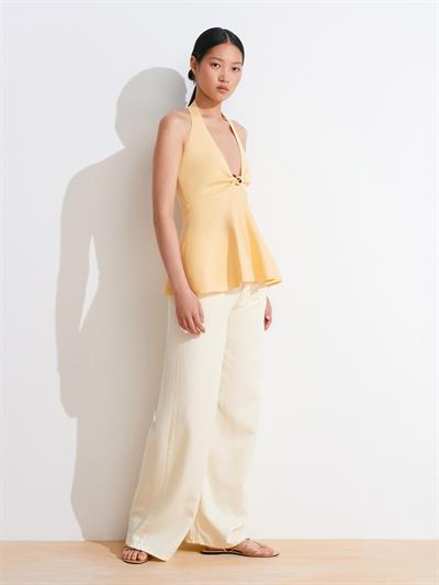 YELLOW HALTER-NECK PEPLUM KNIT BLOUSE