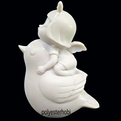 OB 2273 - Kuş Üzerinde Yatan Melek Kız Ham Polyester Dekoratif Obje