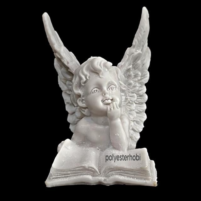 ob-1997-melek-kitap-okuyan-ham-polyest-3-6cbc.jpg