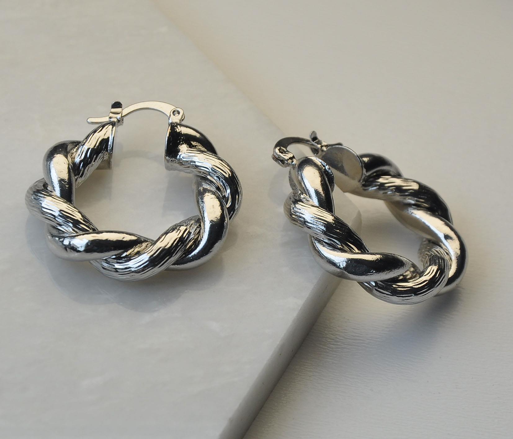 Silver burgu tasarım küpe