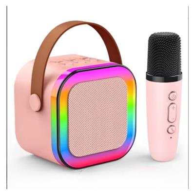 Pembe K12 Renkli Işıklı Karaoke Hoparlör Tek Mikrofonlu Taşınabilir Bluetooth Müzik Kutusu Led Efektli Kablosuz Şarjlı Speaker 