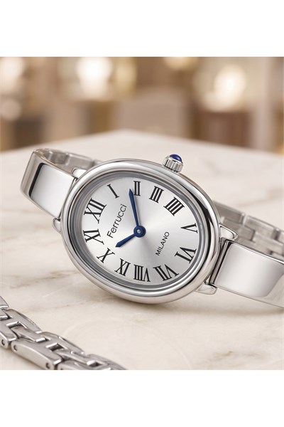 Kadın Kol Saati 28 mm Gümüş Rengi Mavi Detaylı Oval Kasa Kelepçe Kordon