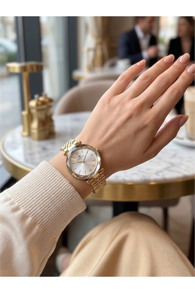 Kadın Kol Saati 34 mm Gold Metal Kordonlu Taş Detaylı Gümüş Kadranlı Saat