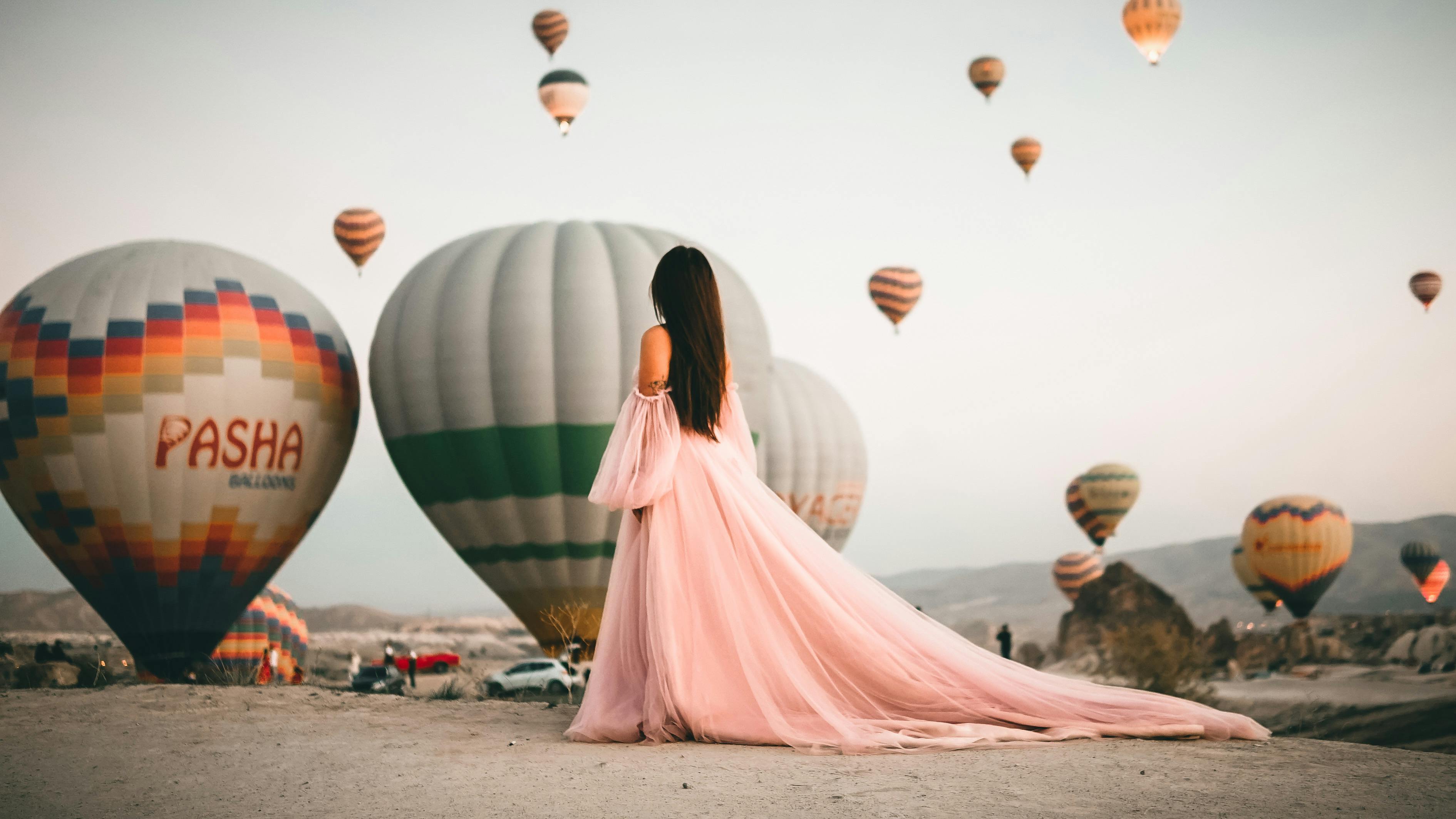 Cappadocia photo shoot with a professional photographer at sunrise over valleys and fairy chimneys