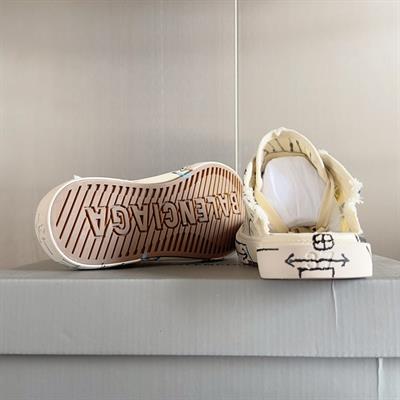 Balenciaga Paris Sneakers – Cream Distressed Graffiti Canvas Edition