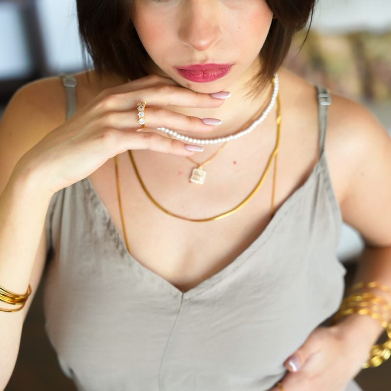 Layered gold-plated necklaces