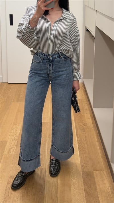 Paçası Kıvrık Denim Jean