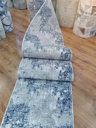 By Özer Halı Sina Mavi Renk Geçişli Geometrik Desenli Kaymaz Tabanlı Kesme Yolluk Halı