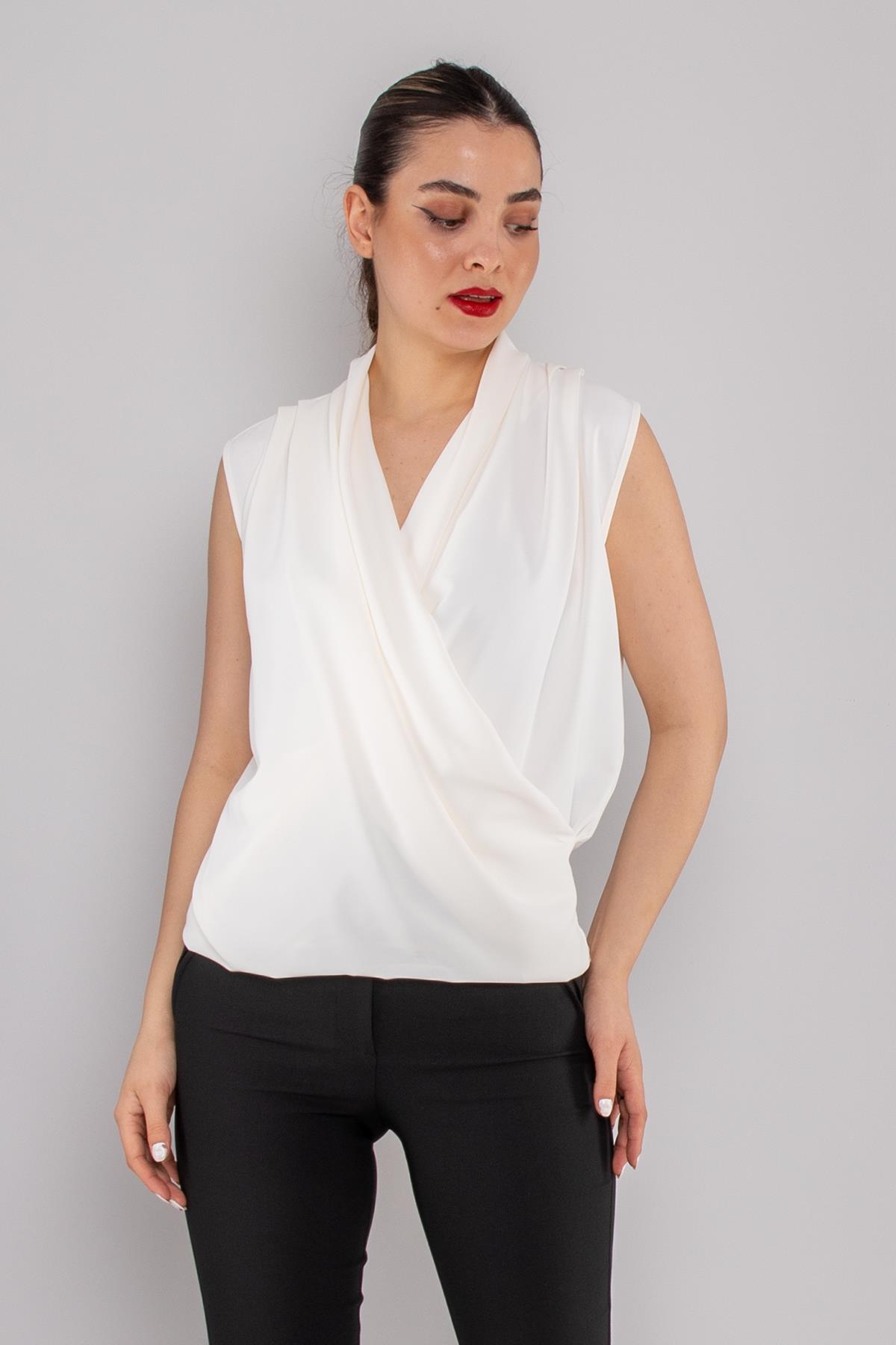 81856 Kruvaze Yaka Dökümlü Kolsuz Şifon Bluz