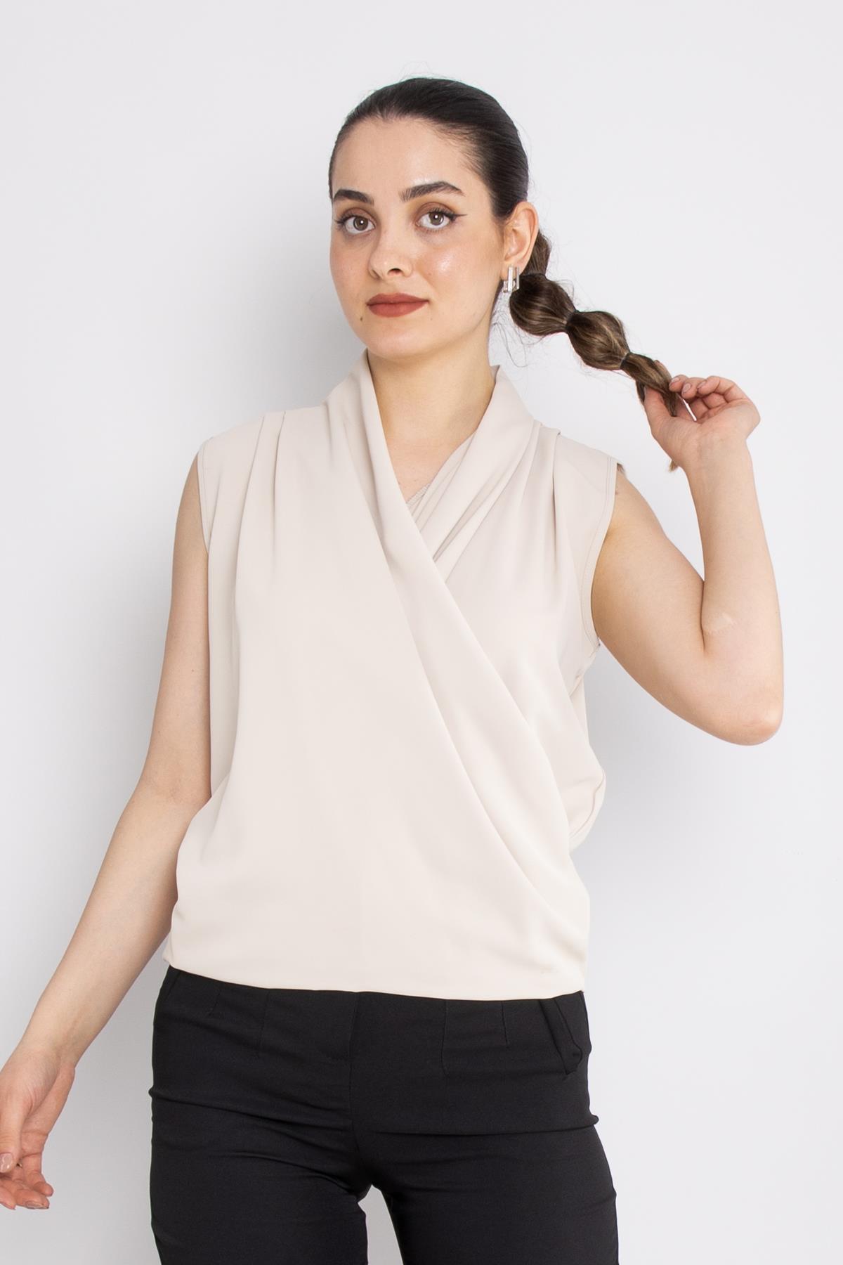 81856 Kruvaze Yaka Dökümlü Kolsuz Şifon Bluz