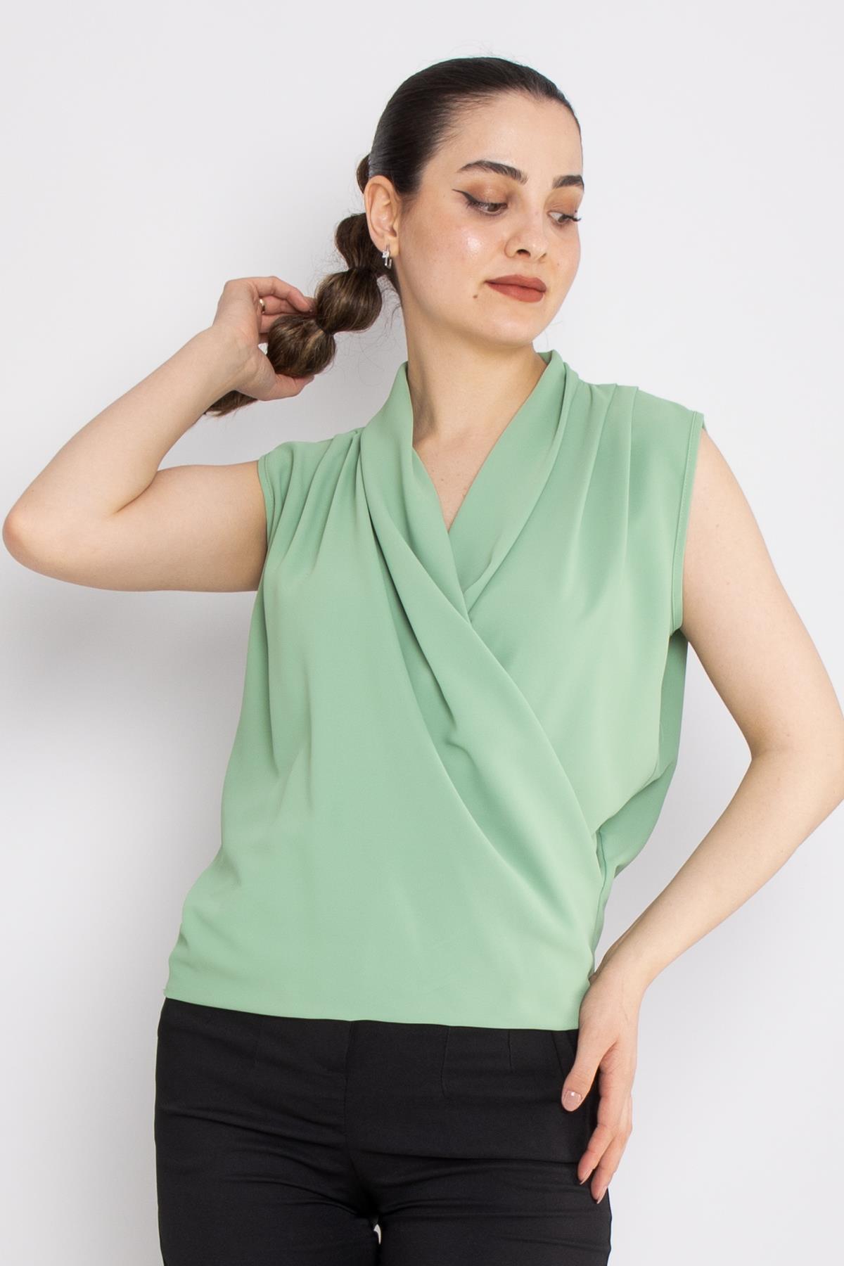 81856 Kruvaze Yaka Dökümlü Kolsuz Şifon Bluz