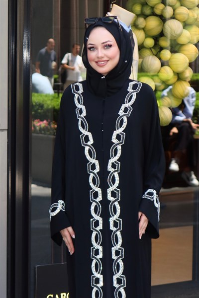 TEBESSÜM ABAYA
