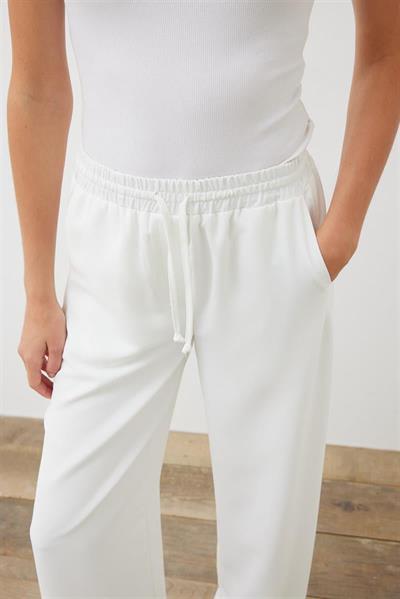 EVA CREPE PLEATED PALAZZO PANTS WHITE