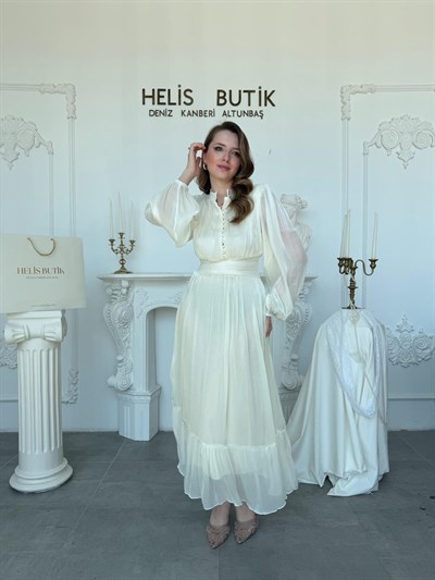 Bel Vurgulu Işıltılı Kumaş Düğme Detaylı Hakim Yaka Elbise - Krem