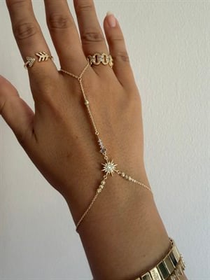 Light gold renk,altın kaplama kuzey yıldızı ve dorika detayları olan mükemmel tasarım şahmeran