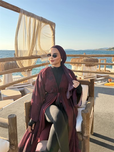 Nur Abaya-Mürdüm 