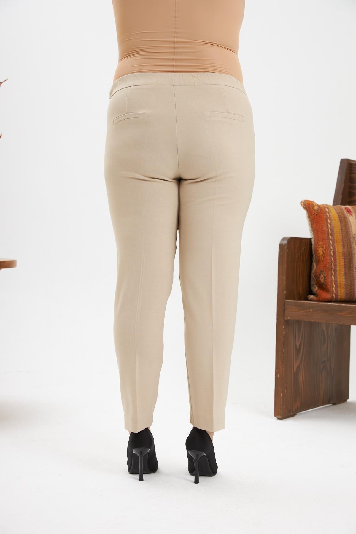 Bel Lastikli Paça Mini Yırtmaçlı Büyük Beden Krem Kumaş Pantolon