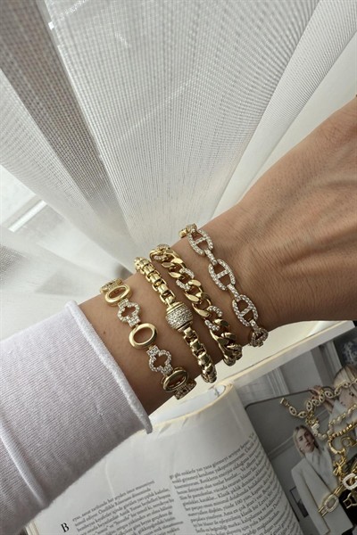 XUPİNG KARARMAZ GOLD ZİRKON TAŞLI SİLİNDİR MODEL BİLEKLİK