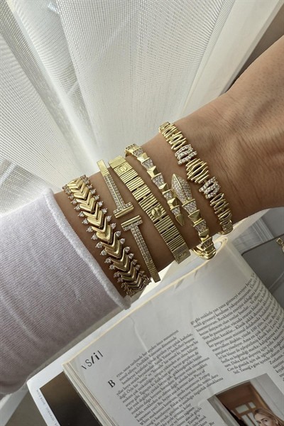 XUPİNG KARARMAZ GOLD ZİRKON TAŞLI ZİKZAK MODEL BİLEKLİK
