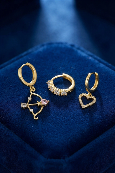 3 lü Set Küpe Gold Renk Eros Yay Detaylı