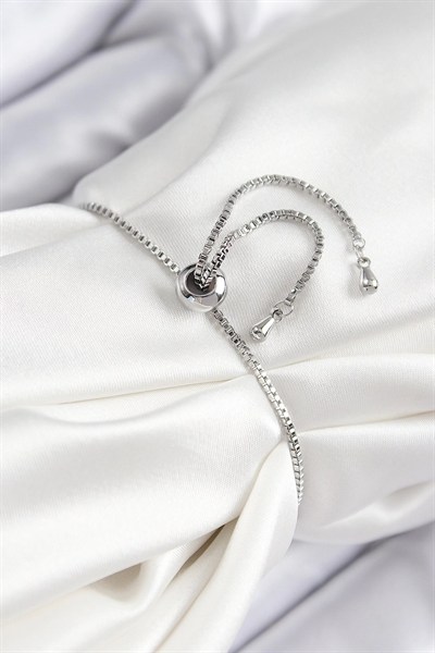 Mey İthalat® Pirinç Zirkon Taşlı Sıralı Ok Model Gümüş Renk Asansörlü Kadın Bileklik