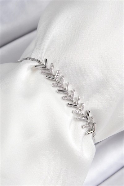 Mey İthalat® Pirinç Zirkon Taşlı Sıralı Ok Model Gümüş Renk Asansörlü Kadın Bileklik