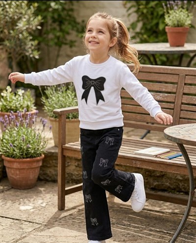 Kız Çocuk TakımKız Çocuk Taşlı Kot Pantolon ve Fiyonklu Sweatshirt İkili Takım Siyah