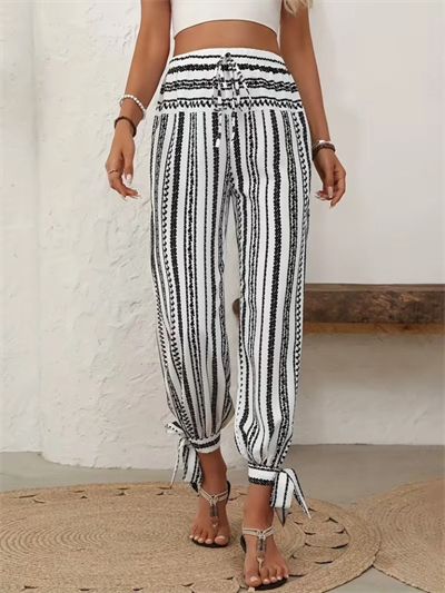 Kadın Yüksek Bel Desenli Paçadan Bağlamalı Yanları Yırtmaçlı Süprem Pantolon