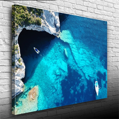 Turkuaz Sularda Mağaraya Giren Tekne Kanvas Tablo 50 x 70