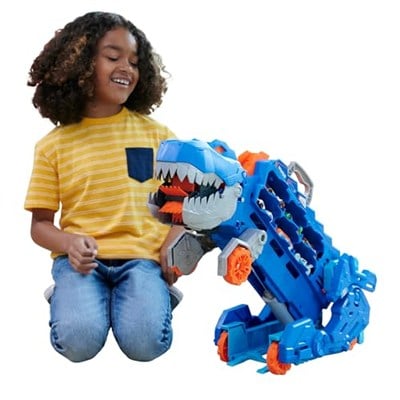 Hot Wheels Şehri Ultimate T-Rex Tır, T-Rexe Dönüşür, Yarış Pisti İçerir, Işıklı ve Sesli, 20+ 1:64 Ölçekli Araba için Depolama Alanı, HNG50