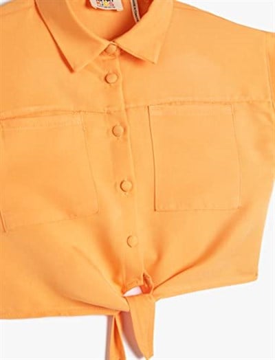 Koton Crop Gömlek Önden Bağlama Detaylı Kısa Kollu Cepli Modal Kumaş Crop Gömlek Önden Bağlama Detaylı Kısa Kollu Cepli Modal Kumaş Kız çocuk