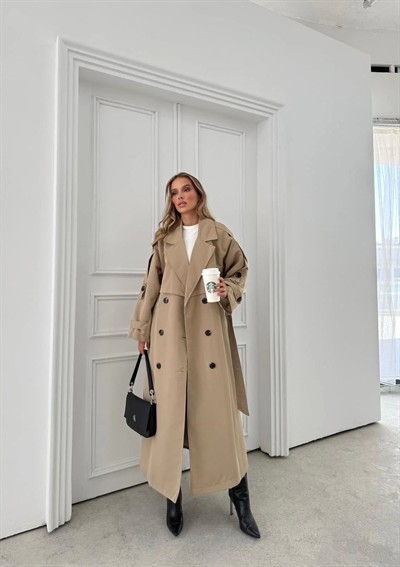 UZUN BEL VE KOL KUŞAKLI DÜĞME DETAY İÇ ASTARLI OVERSİZE TRENÇKOT KREM