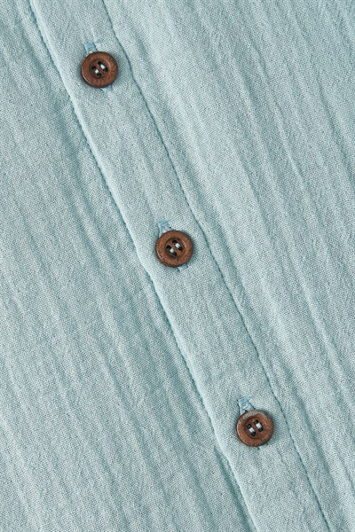 Turkuaz Müslin Uzun Kollu Romper