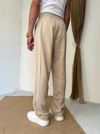 Tensel Kumaş Pileli Krem Baggy Pantolon