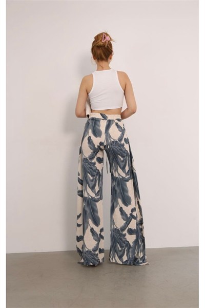 Kadın Desenli Yırtmaç Detaylı Bağlamalı Pantolon