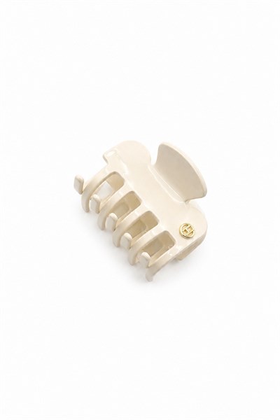 Bone-Style Hair Claw Clip with Metal Emblem and Cutout Detail - White