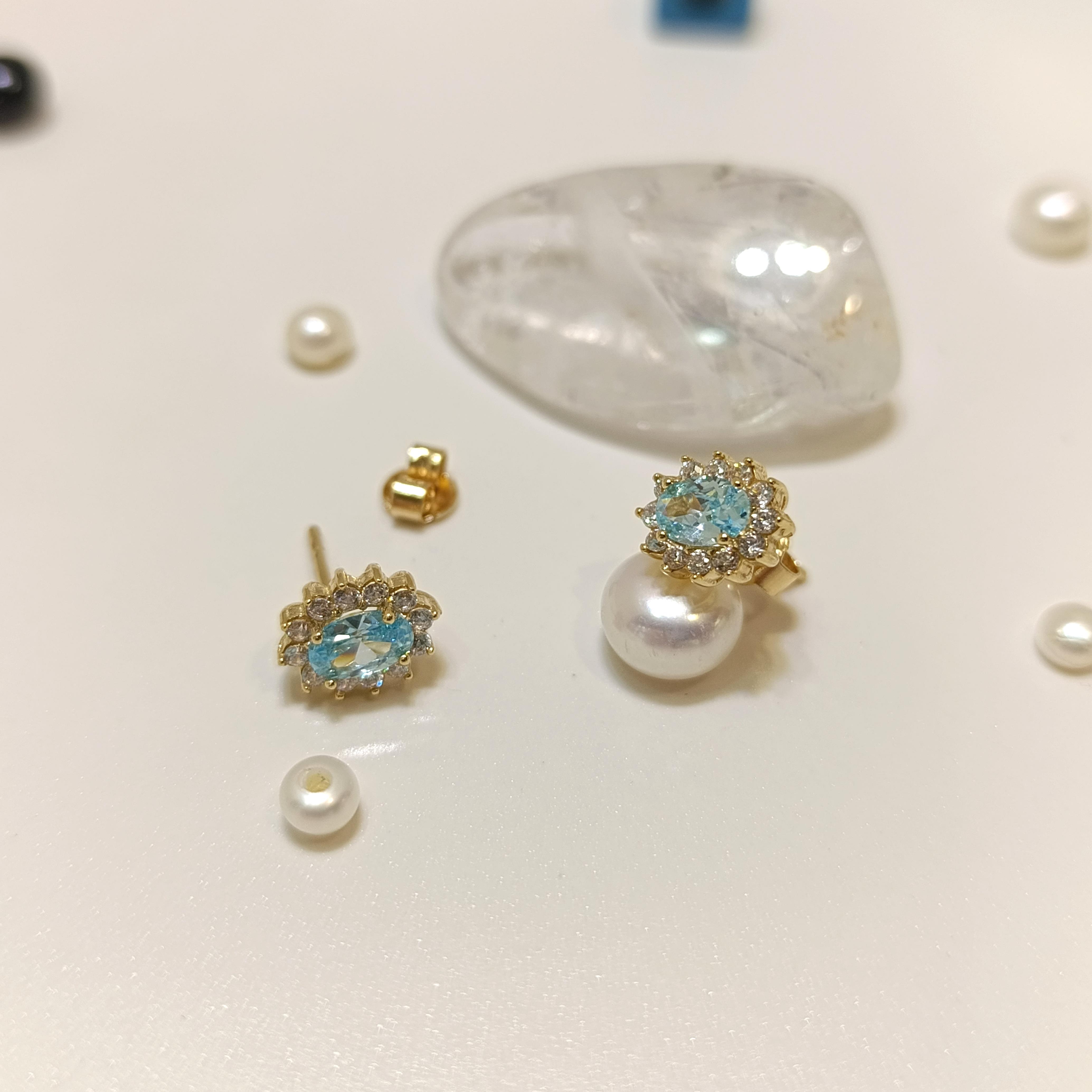 9.9mm Vidalı Oval Aqua Mavisi Tek Taş Küpe 14 Ayar Altın HD VİDEOLU