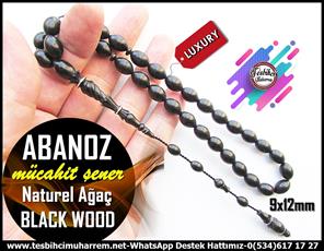 Abanoz Ağacı TesbihlerTM13791Mücahit Şener Usta İşçilikli Tespih | Abanoz (Black Wood), Doğal Malzeme, Beyzi Kesim, Oymalı  Model – “Abanoz” TesbihTespih Black Wood  l Oymalı İmame Gümüş Çember Beyzi Kesim Naturel Abanoz 