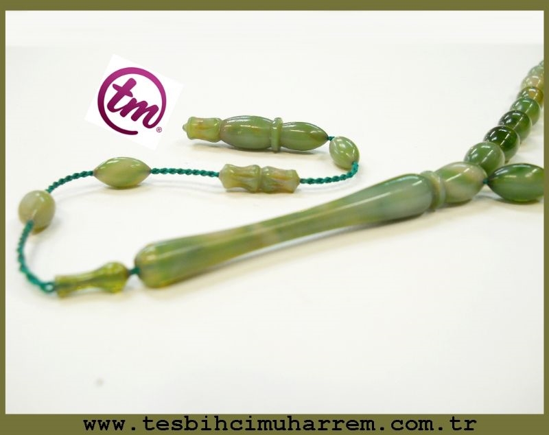 6.5X11.5 mm TESBİH-ÜL BAHARİSTAN DAMARLI YEŞİLLER TONDA SIKMA KEHRİBAR