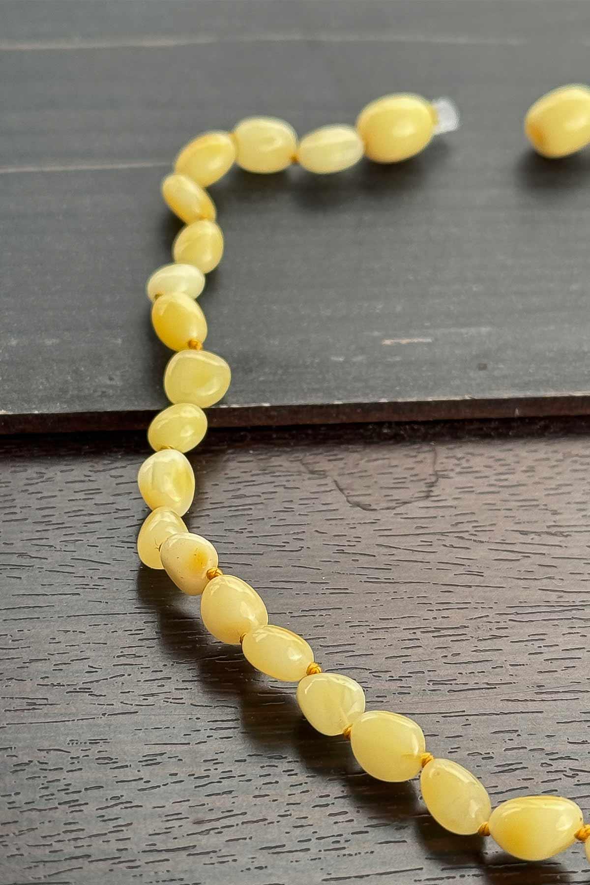 Kaya Damla Kehribar Bebek Kolye