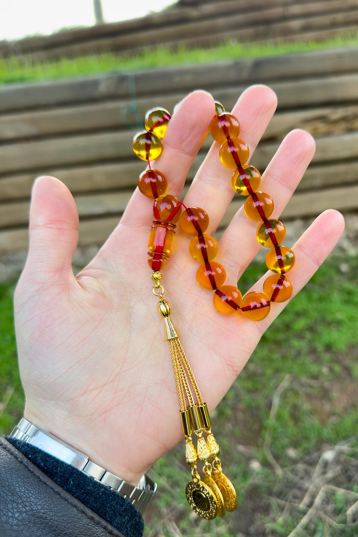 Turuncu Renk Gold Püsküllü 17lik Ateş Kehribar Tesbih
