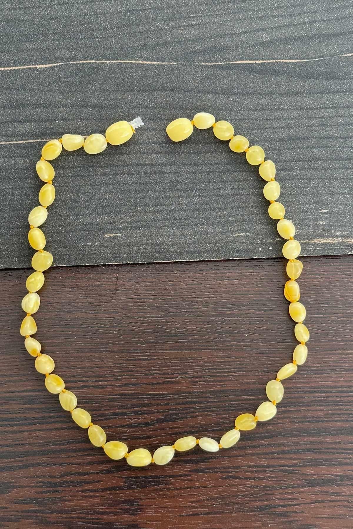 Kaya Damla Kehribar Bebek Kolye